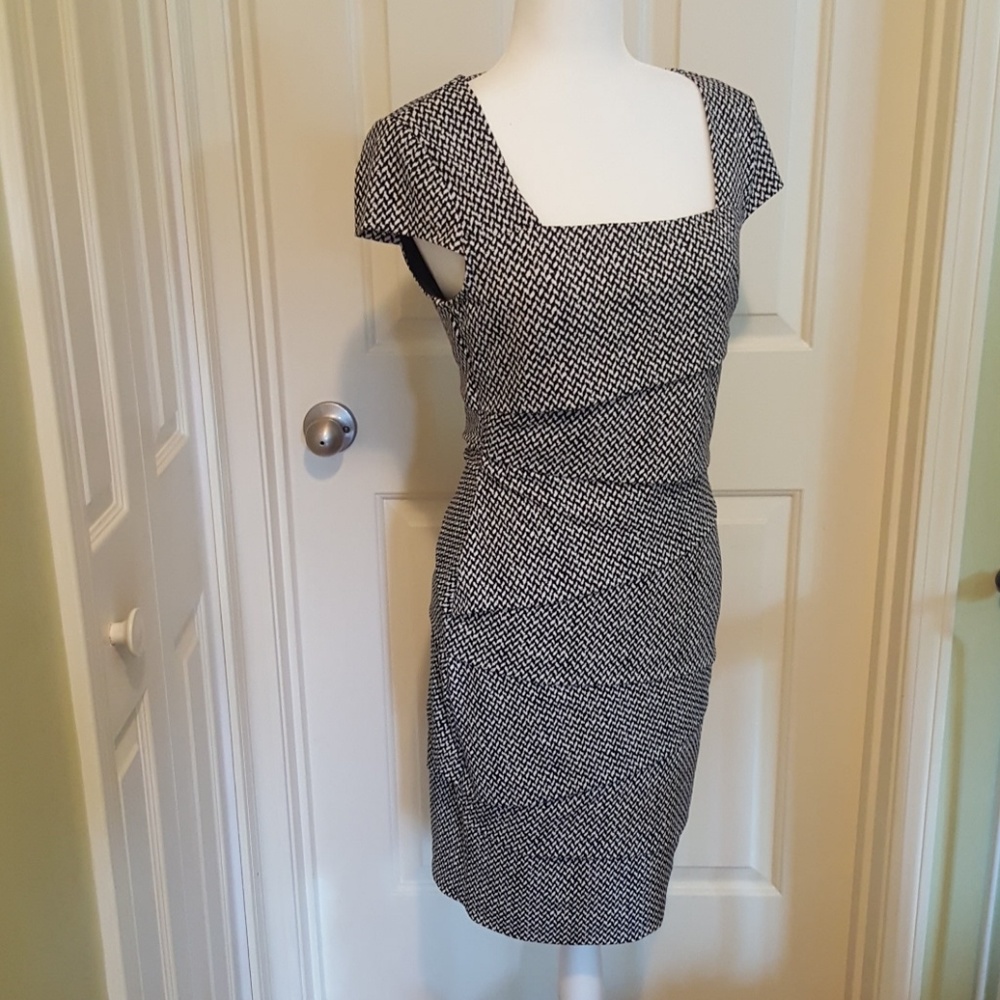 Make me an offer.  Instantly slimming dress
